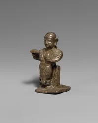 Fêmea sentada, séc. XIV-XIII a.C. (prata)
