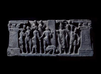 Arte de Gandhara (ou Greco-Buddhismo): "Arqueiro Devadatta ataca Gautama" (arqueiros do Devatta atacam Gautama Buda) Alívio da Escola de Gandhara - séculos II a IV - Museu Indiano, Calcutá Índia