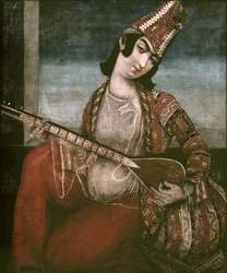 Jovem mulher tocando uma guitarra