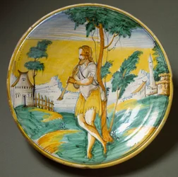 Flautista numa paisagem. Prato de cerâmica produzido em Viterbo, Itália. Finais do século XVI, Florença, Museo Nazionale del Bargello