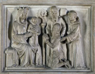 Madonna e Child, com um guerreiro e santos, alívio criado ??por Os Mestres de Campione. Itália