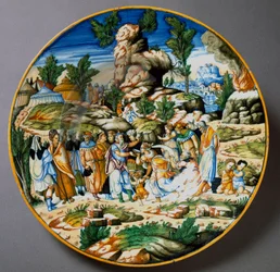 Moisés faz brotar água da rocha e dá de beber ao povo de Israel. Prato de cerâmica produzido em Urbino na oficina Fontana, Itália. Cerca de 1560, Florença, Museo Nazionale del Bargello