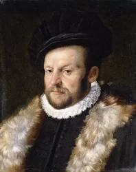 Retrato de um cavalheiro barbudo, comprimento do busto, vestindo uma jaqueta preta com colarinho branco,