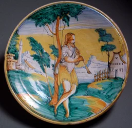 Arte renascentista: prato decorado com um flautista (Um flautista) - Fim do século XVI. Produção de Viterbo (Viterbo), Itália. Florença, Museo Nazionale del Bargello