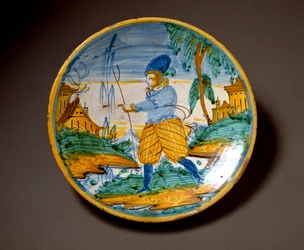Jovem da nobreza. Prato de cerâmica produzido em Viterbo, Itália. Fim do século XVI, Florença, Museo Nazionale del Bargello