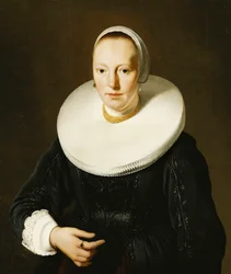 Retrato de uma senhora, de meio comprimento, com um vestido preto e um aplique preto e um babado de pedras preciosas,