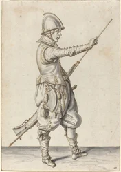 Soldado elegantemente vestido socando seu calibrador