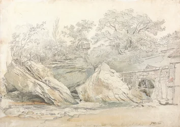 Moinho de água numa paisagem rochosa