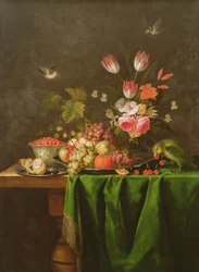 Natureza-morta de frutos e flores com um papagaio sobre uma mesa coberta com um pano verde