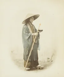 Homem japonês em vestido tradicional (foto a p/b colorida à mão)