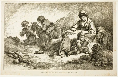 Mãe e filhos com ovelhas