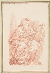 Figura sentada com tablet