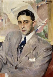 Retrato do actor Ramón Peña, de meio corpo, com fato cinzento