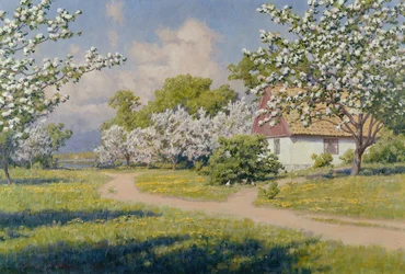 Uma paisagem arborizada com uma casa de campo na primavera