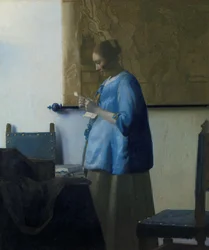 Mulher de azul lendo uma carta Mulher lendo uma carta