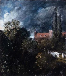 Vista em um jardim com uma casa vermelha além