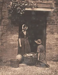 [Duas mulheres, uma ajoelhada e uma em pé, olhando para uma cesta cheia de legumes], 1853-56.