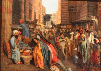 Francês: La Rue et la mosquée al-Ghouri au Caire Cena de rua perto da Mesquita El Ghouri no Cairo