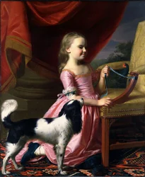 Jovem senhora com um pássaro e um cão