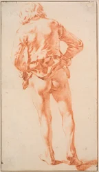 Um homem seminu, andando, visto de costas