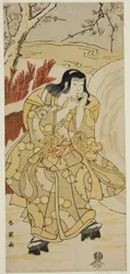 O ator Iwai Hanshiro IV como um rapaz que sopra com as mãos ao lado de uma grande bola de neve, na peça Nigiwai Genji Hana Saku Kado, representada no Teatro Kawarazaki no décimo primeiro mês de 1793