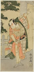 O ator Otani Hiroji III em uma pose de palco (Mie) diante de um portal do santuário