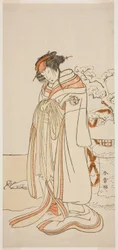 O ator Segawa Kikunojo III como a cortesã Kisewata (Tagasode) (?) na peça Hana-zumo Genji Hiiki (?), encenada no Teatro Nakamura (?) no décimo primeiro mês, 1775 (?)