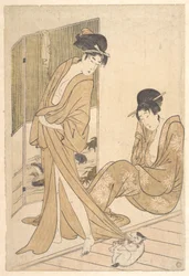 Duas jovens envoltas em yukata depois de um banho
