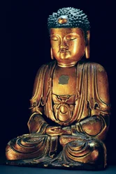 Uma figura do Buda sentado (laca de ouro)