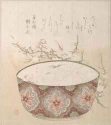 Taça com peixes brancos e flores de ameixeira