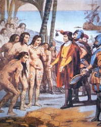 Cristóvão Colombo desembarca no Novo Mundo em 1492 e é recebido por índios taínos