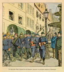 A Armee Oriental do Sargento Eugene, conhecida como Grenest, ilustrada por Louis Bombled (1862-1927) (Guerra Franco-Alemã; campanha de 1870-1871): Capitão Huot desce a Rue Battant em Besancon com prisioneiros prussianos capturados em Bethoncourt les Brotte