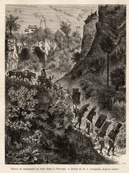 Um comboio de mercadores e seus carregadores a caminho de Yunnan (China), gravado após o desenho de L. Delaporte, para ilustrar a viagem de exploração na Indochina de Francis Garnier, tenente de navio, em 1866-1868, publicado em "Le tour du monde" 187