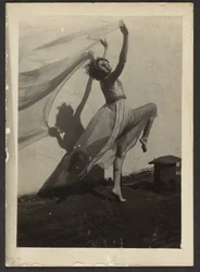 [Florence Dancing on Rooftop].