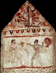 Dois atletas a praticar pugilato (boxe). Fresco lucano do século IV a.C., proveniente da necrópole de Paestum, Itália. Museo Archeologico Nazionale, Paestum