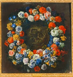 Coroa de flores com, no centro, uma cena bíblica