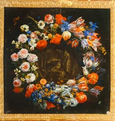 Coroa de flores com, no centro, o sacrifício de Isaac