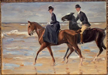 Cavaleiro e amazona na praia