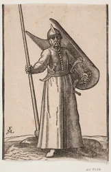 Soldado ereto com capacete na cabeça; em r. entregar uma lança, cujo topo está fora da linha de armação superior; no v. armar um escudo curvo, visto de dentro; no cinto sob o braço direito uma adaga curvada, ao lado v uma espada