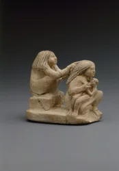 Grupo de duas mulheres e uma criança, c.1981-1500 aC (calcário, tinta)