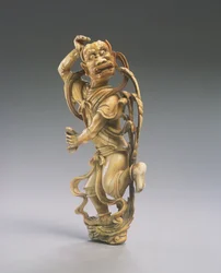 Uma figura de Kui xing (marfim esculpido) (ver também 272115)