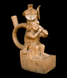 Arte pré-colombiana, civilização mochica (feia): vaso antropomórfico de terracota representando uma personagem que toca a Quena, flauta dos Andes. 200 AC-700 DC. Lima, Museu Nacional de Antropologia e Arqueologia, Peru