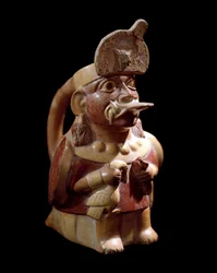 Arte pré-colombiana, cultura Moche (Moche, Mochica): vaso antropomórfico representando um sacerdote a sacrificar dois animais. 200 a.C.-700 d.C. Lima, Museu Nacional de Antropologia e Arqueologia