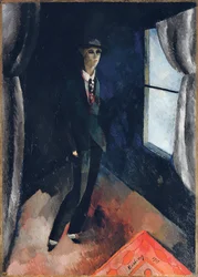 Homem em frente à janela