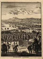 Centuriões romanos e legionários ouvem um discurso.
