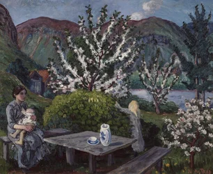 Mãe e filho na mesa de jardim