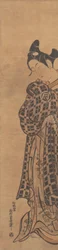 O ator Sanogawa Ichimatsu quando jovem segurando uma carta dobrada, ca. 1765.