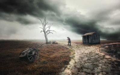 Figura solitária, céu tempestuoso