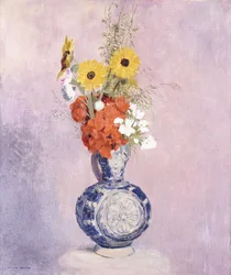 Buquê de flores em um vaso azul,