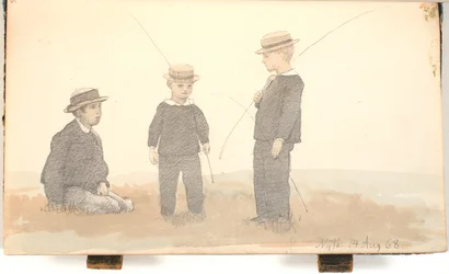 Três meninos com chapéus de palha